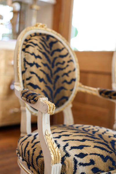 Pair of Custom Painted Louis XVI Antique Carved Fauteuil with Gold Leaf Upholstered in Tiger Print