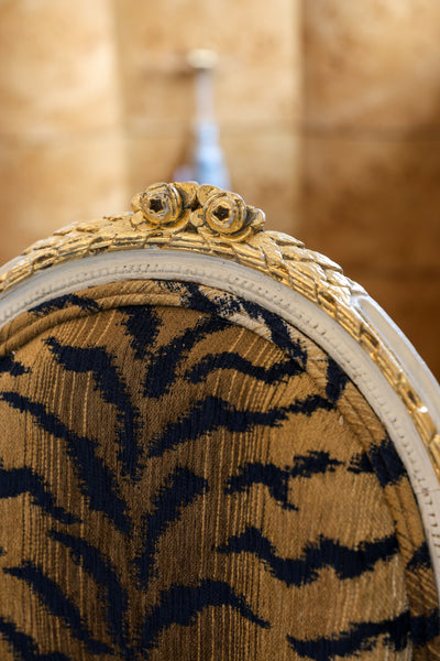 Pair of Custom Painted Louis XVI Antique Carved Fauteuil with Gold Leaf Upholstered in Tiger Print